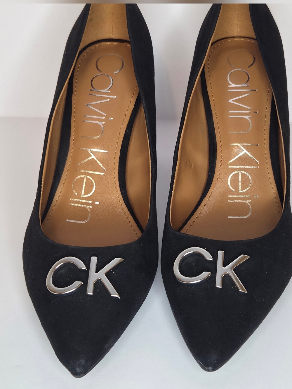 Calvin Klein Black Pointed Toe Pumps with CK Accent